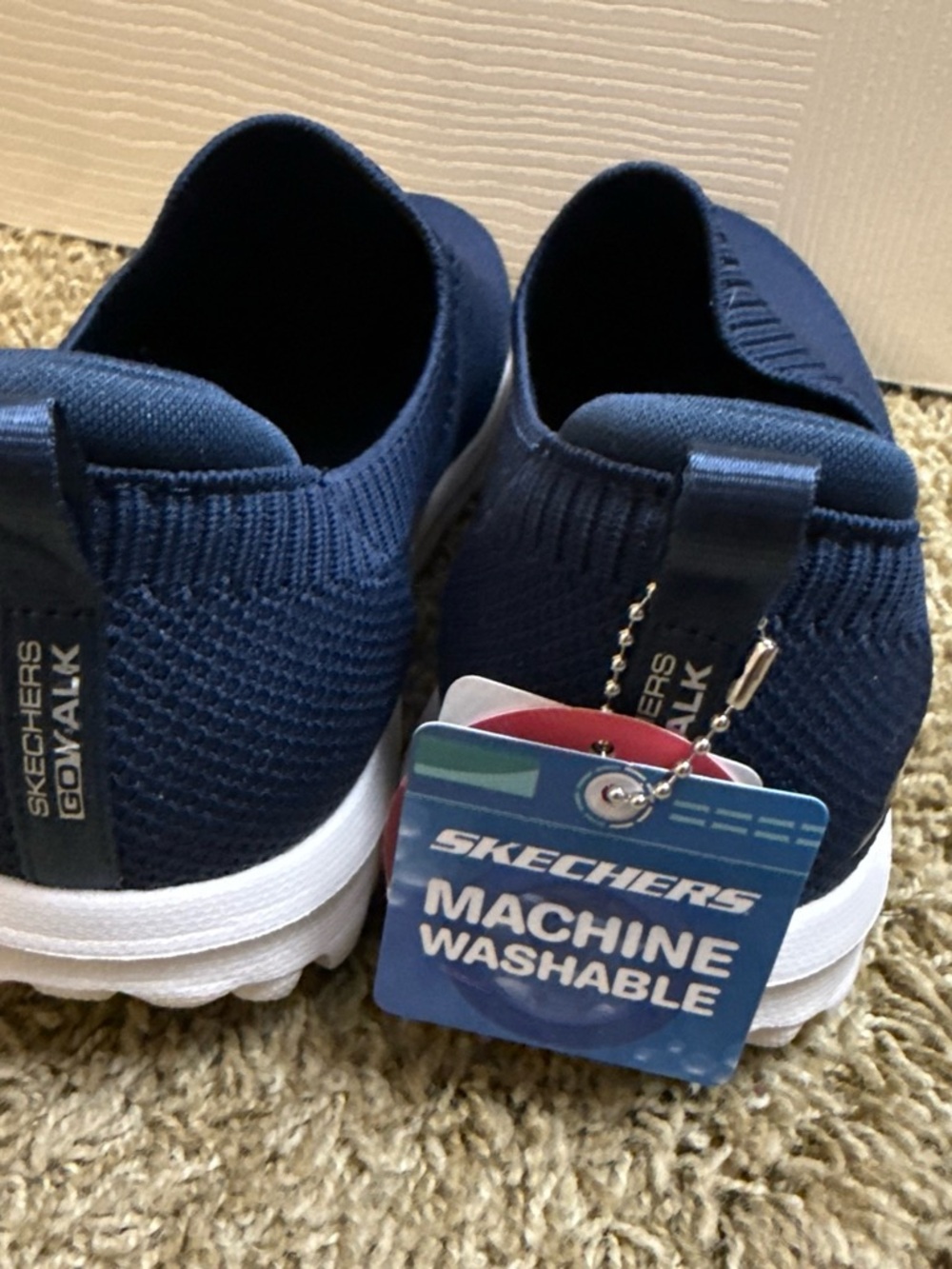 Skechers Go Walk Knit Slip-On Sneakers in Navy and White - Picture 2 of 5